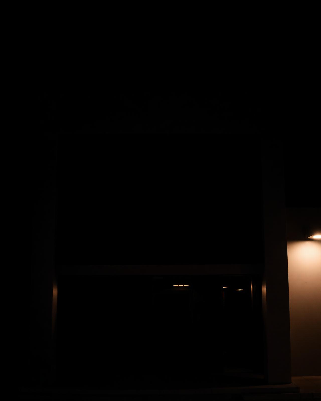 Placeholder frame: modern architectural facade at night
